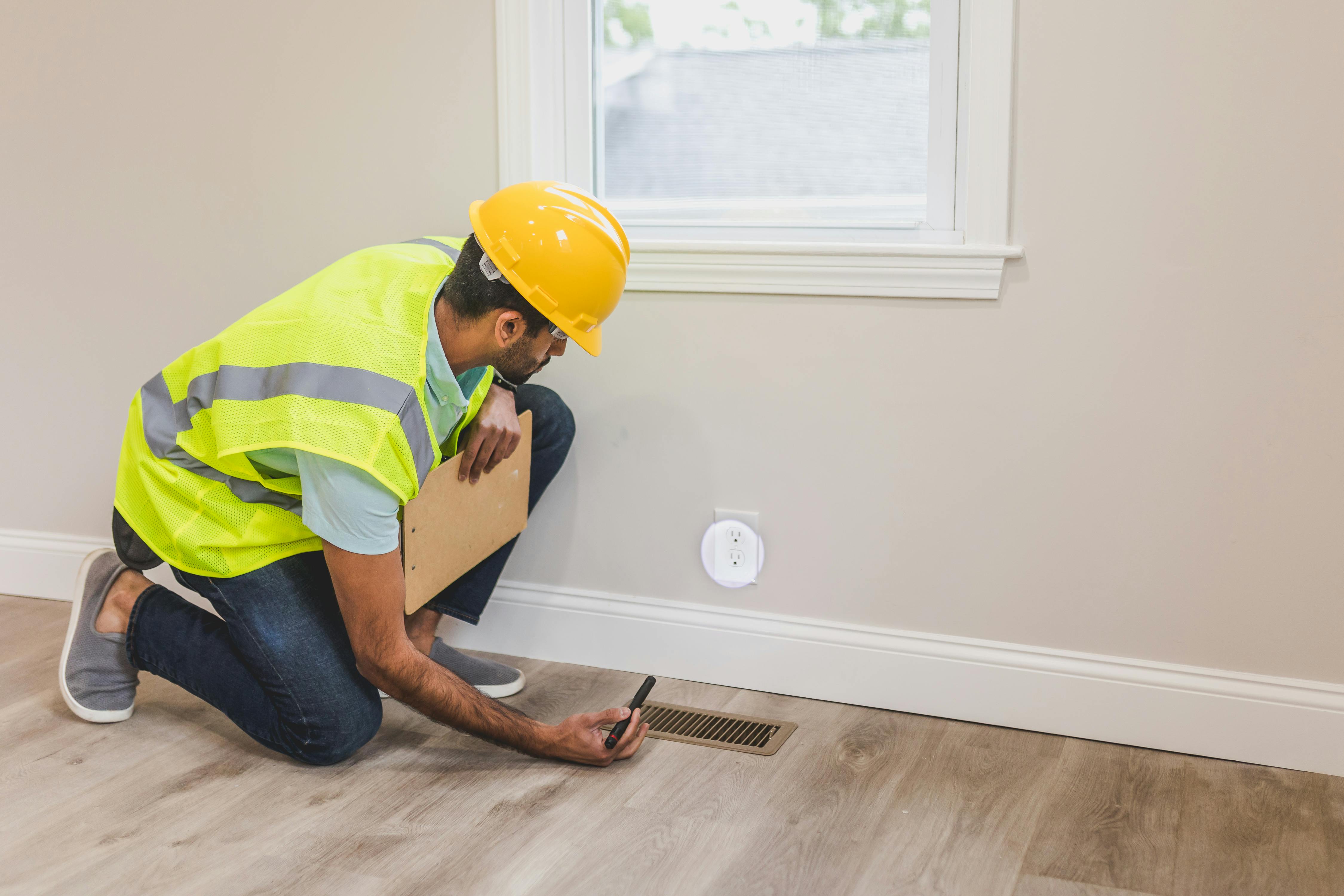 HVAC technician performing maintenance in Ocala home